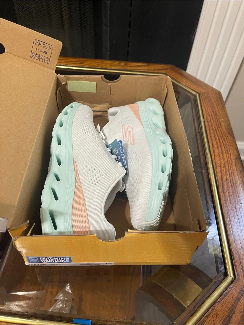 Skechers Women's White Athletic Sneakers with Mint Sole and Peach Accent